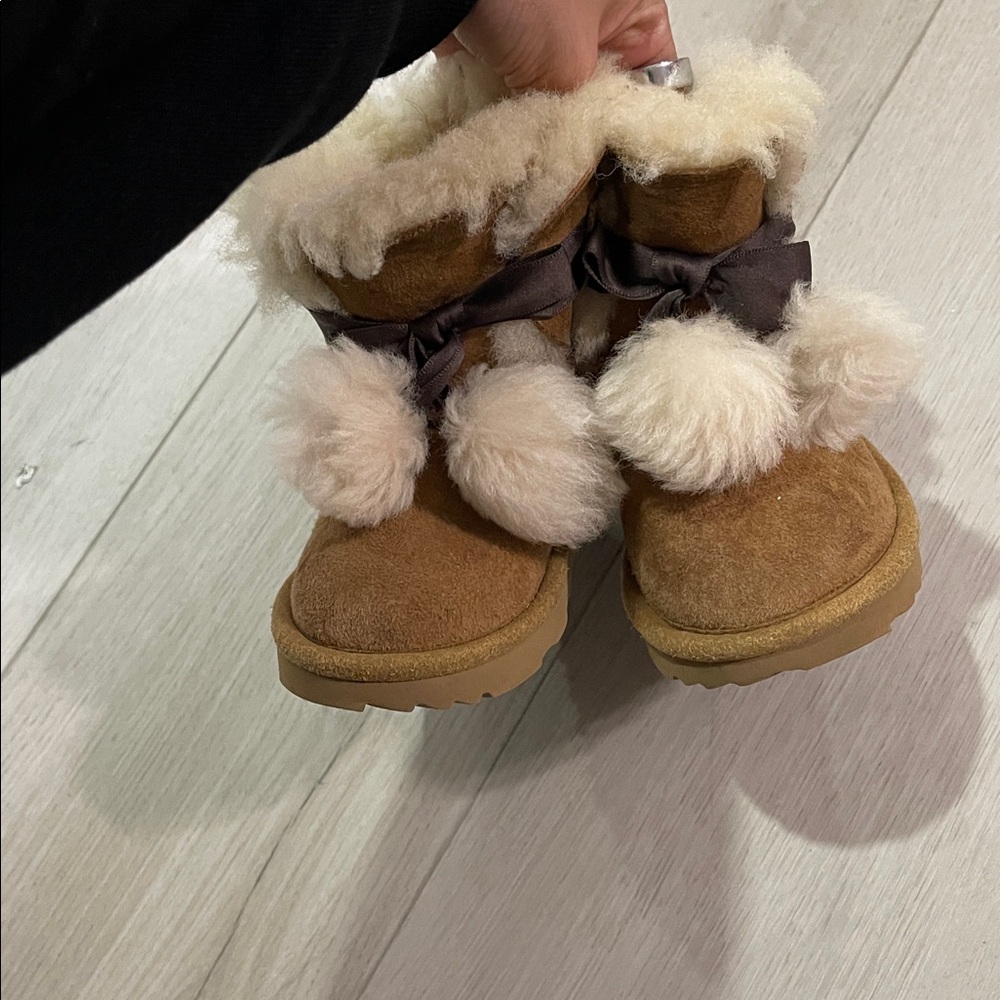 UGG Tan Shearling Boots with Pom Poms